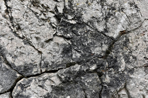 istock Closeup of a cracked limestone surface 867315512
