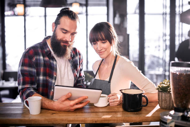 istock Couple having coffee at cafe 867333050