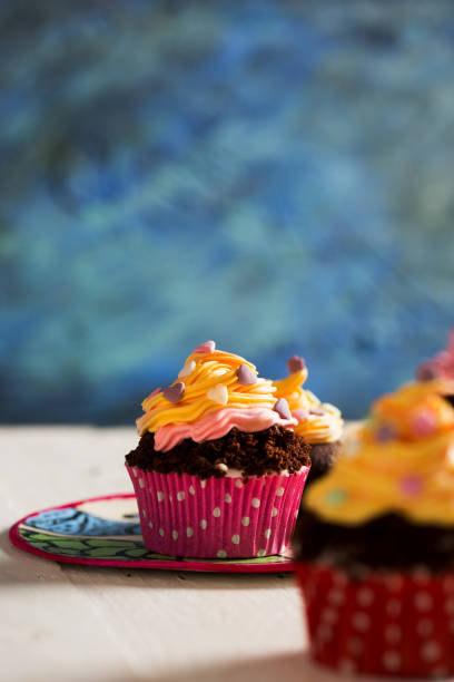 istock Colorful Delicious Cupcakes 867345030