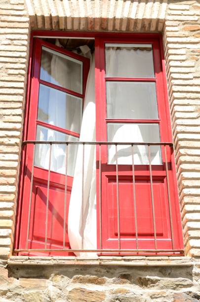istock Wooden red door on balcony 867348482