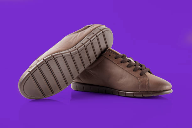 istock Female brown leather shoe 867348796