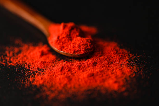istock Spices in wood spoons on table 867356316