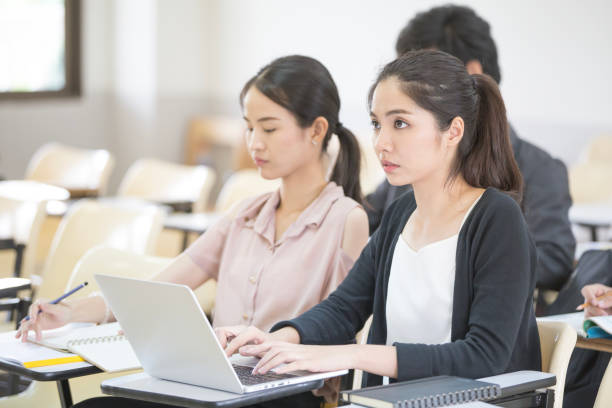 istock Asian People study together in classroom. People with Education concept. People talking in classroom. 867356360