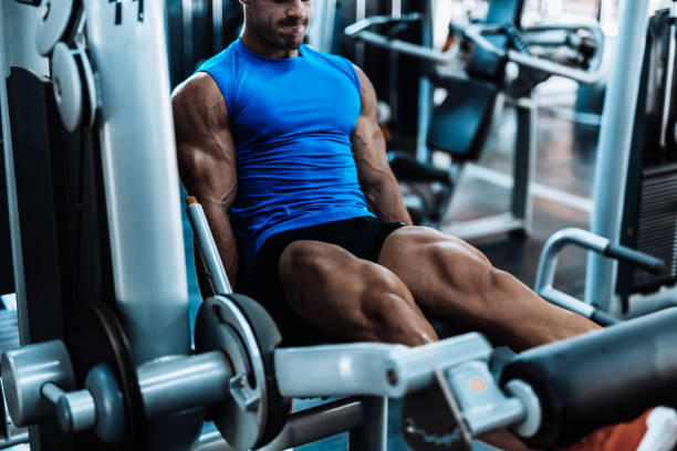 Young man exercising legs