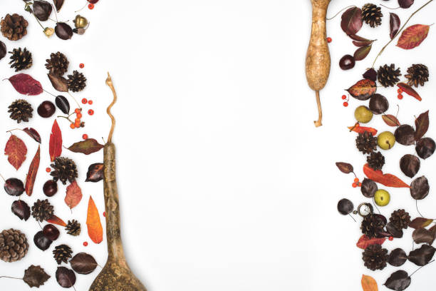 istock dried autumn leaves and pumpkins 867360376