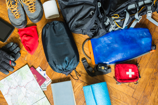 Basic equipment for backpacking by a tourist on a trip.