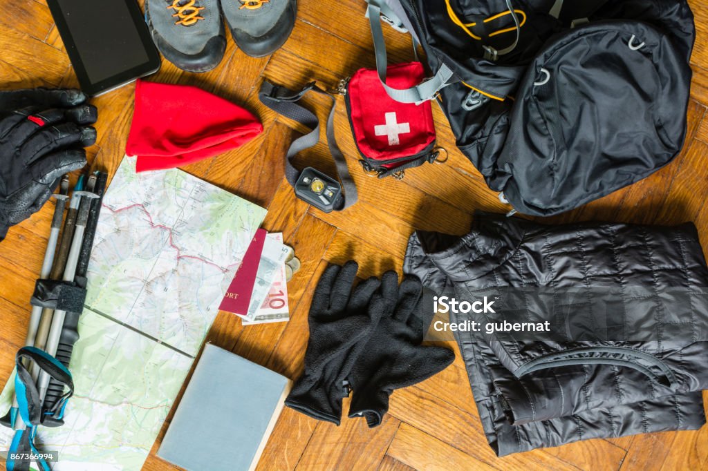 Preparation for packing the backpack. Preparing to pack your rucksack for a walking tour. Hiking Stock Photo