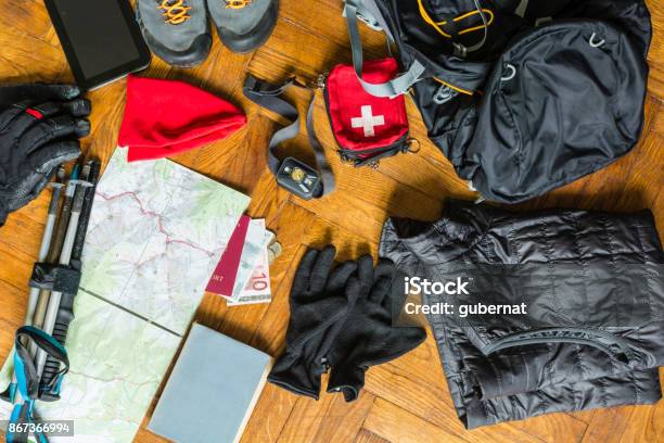 Preparation For Packing The Backpack Stock Photo - Download Image Now - Hiking, Packing, First Aid Kit