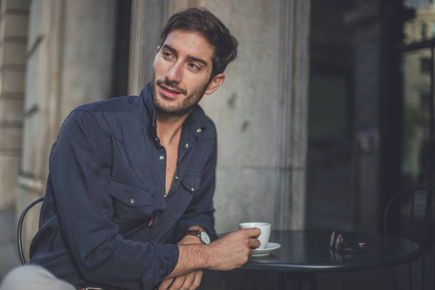 istock Gentleman in cafe relaxing 867370076