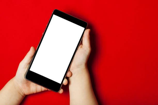 istock smart phone in the hands of a child 867370120