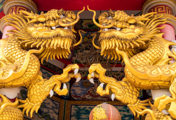 istock Gold dragon statues in Chinese religious venues 867381126