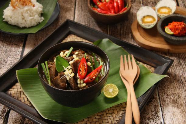 istock Rawon, a Traditional Javanese Beef Soup in Keluak Fruit Broth 867387000