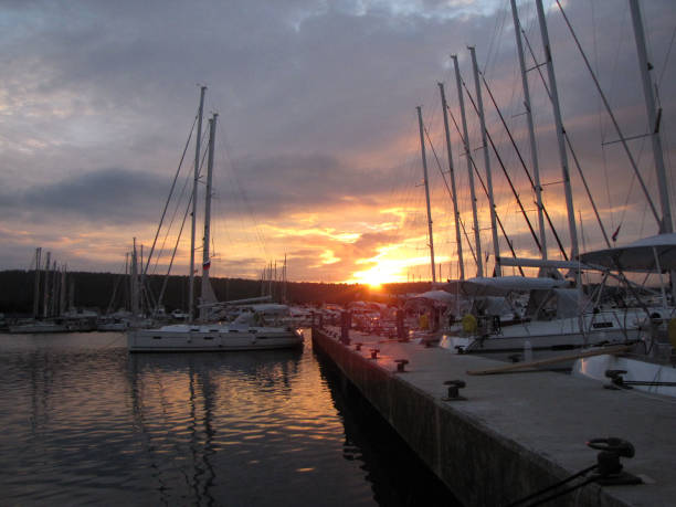 istock yacht moored in the rays of the setting sun 867390012