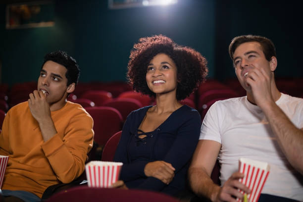 istock Group of people watching movie 867390884