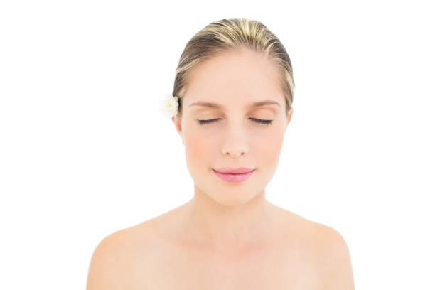 istock Relaxed fresh blonde woman closing her eyes 867390942