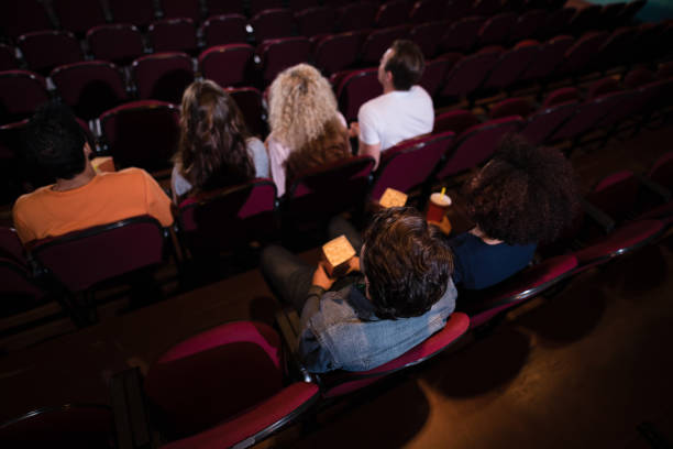 istock Group of people watching movie 867391094