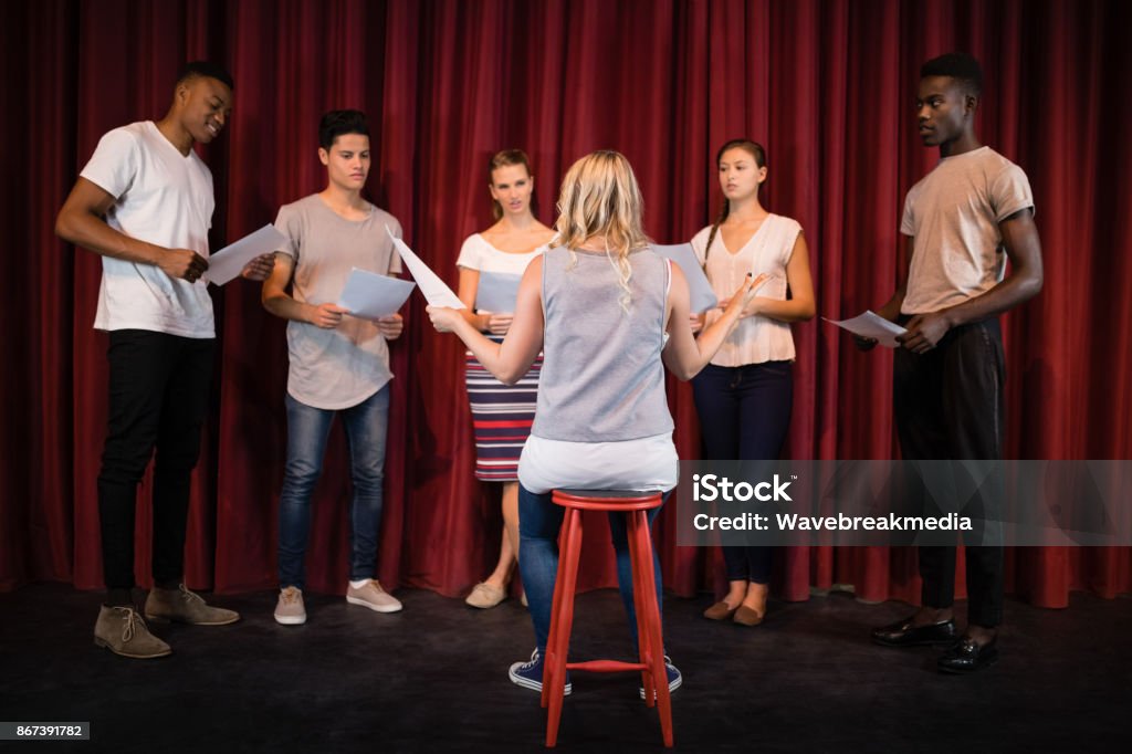 Two Actors Reading Scripts Actors Reading Their Scripts On Stage Stock Photo - Download Image Now ...