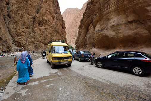 Todra Gorge, Morocco - August 02: Unidentified people in a canyon in Morocco, August 02, 2015. Todra Gorge is a canyon in the High Atlas Mountains in Morocco, near the town of Tinerhir.