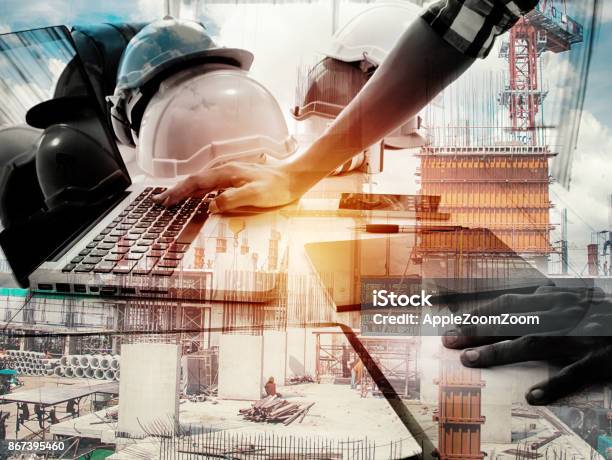 Double Exposure Architect Working With Laptop And Blueprints In Workplace For Architectural Plan Selective Focus Business Concept Stock Photo - Download Image Now