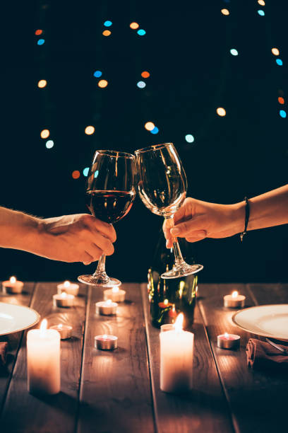 istock Couple clinking glasses with wine 867401676
