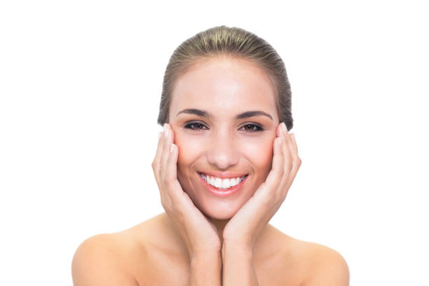 istock Lovely smiling brunette woman looking at camera 867413284