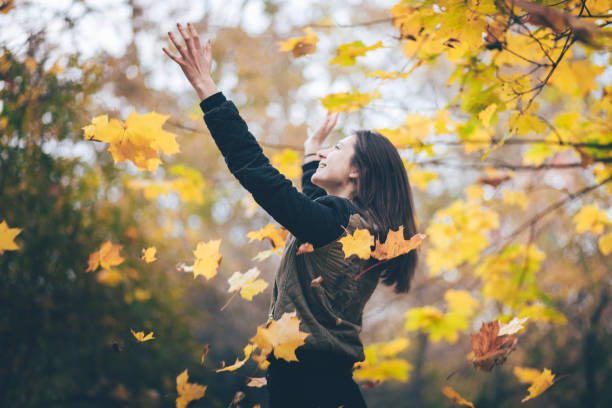 istock Young woman having fun in park. 867417614