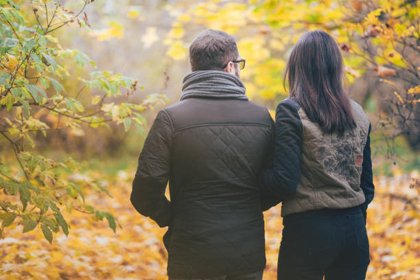 istock Young couple having fun in park. 867417972
