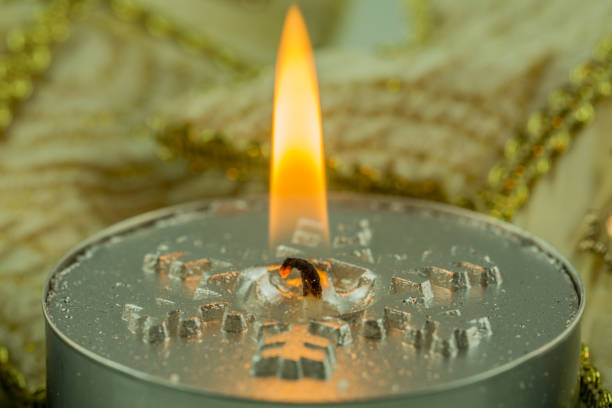 istock burning candles with Christmas motifs and accessories 867422076