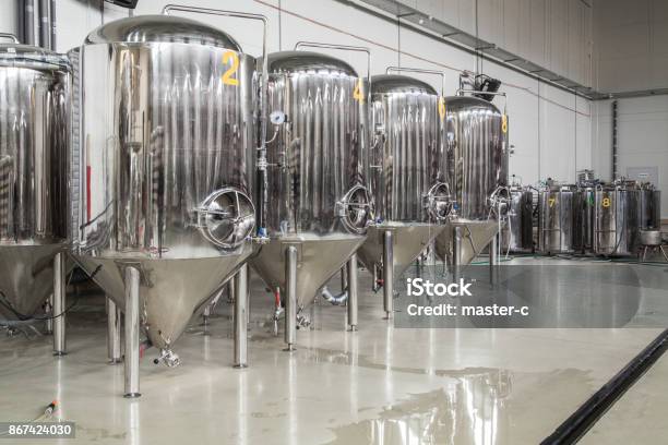 Modern Brewery With Stainless Steel Tanks Stock Photo - Download Image Now - Storage Tank, Brewery, Fermenting