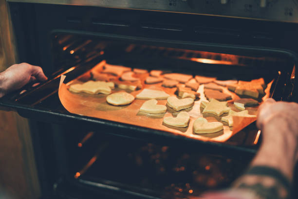 istock person baking christmas cookies 867442910