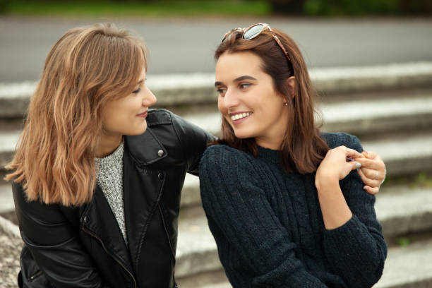 istock Two girls on a walk in the park 867453778