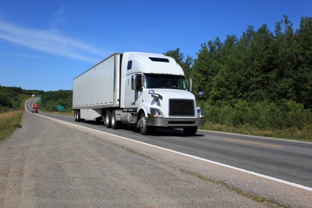 istock Semi truck on highway hauling freight. 867455786