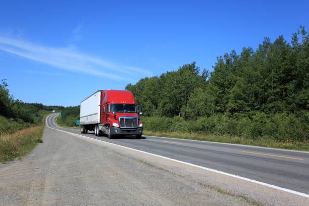 istock Semi truck on highway hauling freight. 867455822