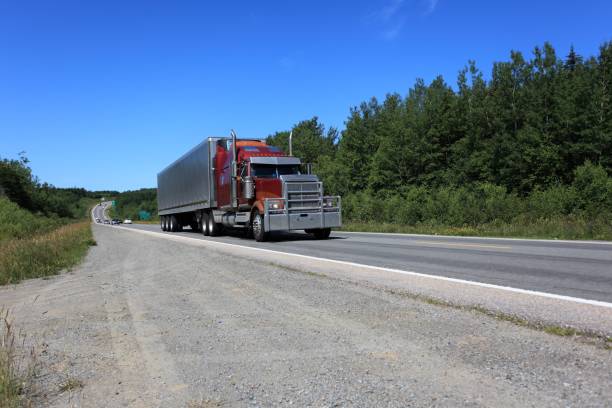 istock Semi truck on highway hauling garbage 867459254