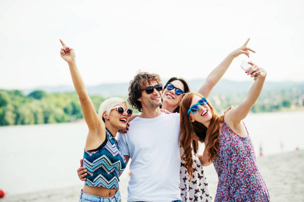 istock Group of people enjoying the beach 867486768