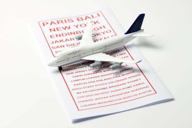 istock Travel brochure with a model airplane 867491696