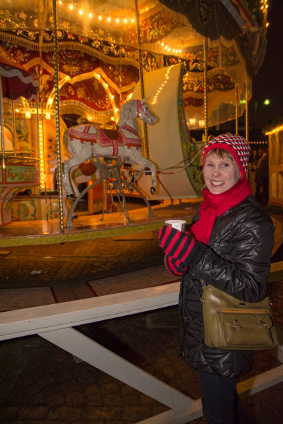 istock Woman in amusement park in winter 867492394