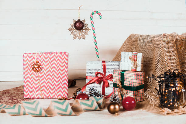 istock Christmas decoration with four presents, lollipop cane and decoration net 867499148