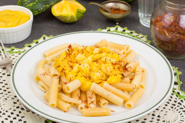 istock Pasta with pumpkin sauce and saffron 867499624