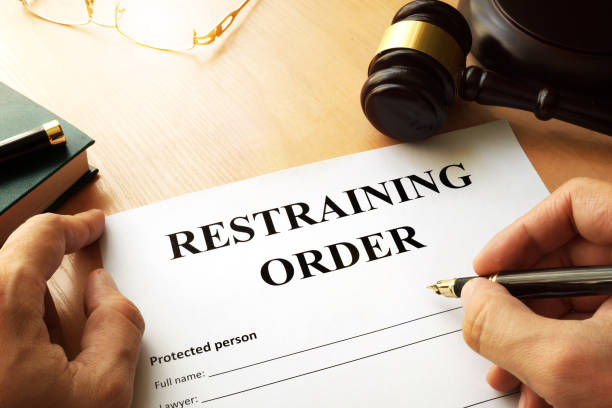 Document with the name restraining order. Document with the name restraining order. order stock pictures, royalty-free photos & images
