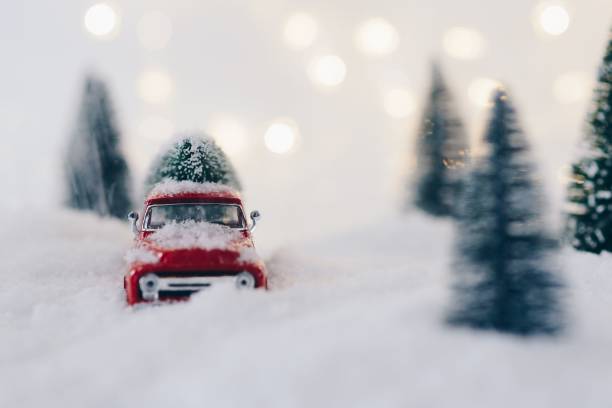 istock Toy pickup car carrying Christmas tree 867503066