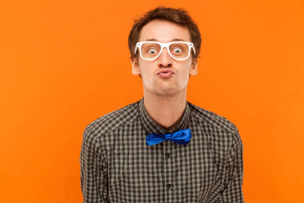 istock Portrait romantic man, send kiss at camera .Showing lips. 867503156