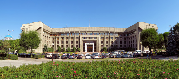 Tashkent, Uzbekistan: Administration of the President of the Republic of Uzbekistan - façade of the presidential headquarters on Independence Square, framed by pine-trees - building formerly used by Uzbekistan's Senate.