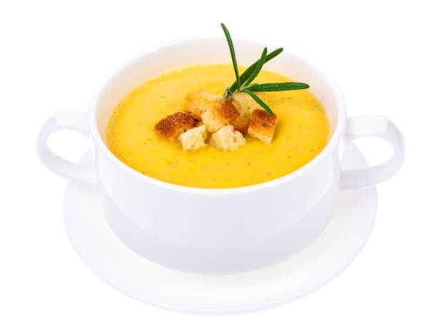 istock Tasty pumpkin puree soup in white soup tureen 867513218