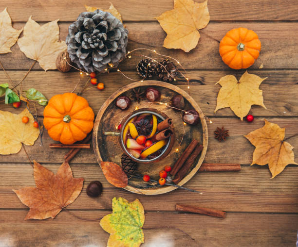 istock Delicious cup of tea on a rustic wooden table. Autumn composition 867516312