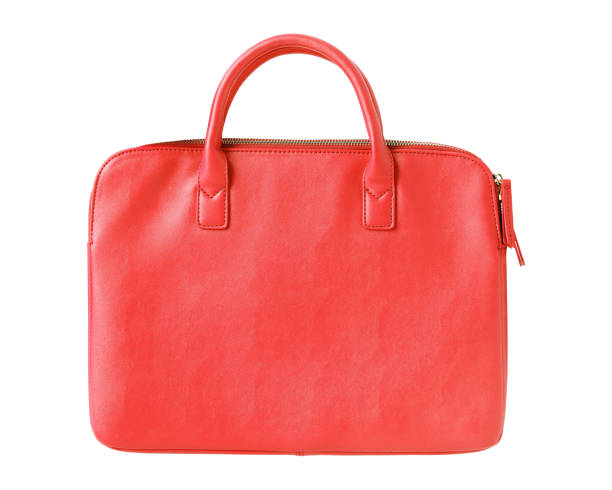 istock Red modern elegant woman leather laptop bag isolated on white 867520724