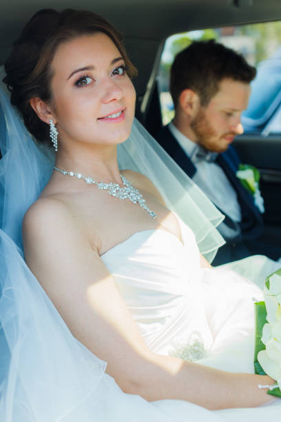 istock Just married couple in a car 867521082