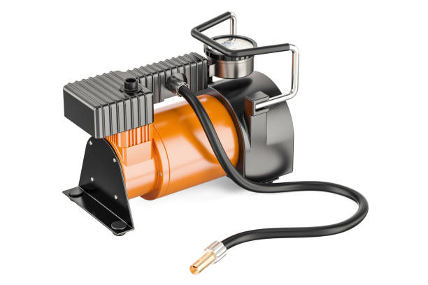 istock Car portable electric air compressor, 3D rendering isolated on white background 867537412