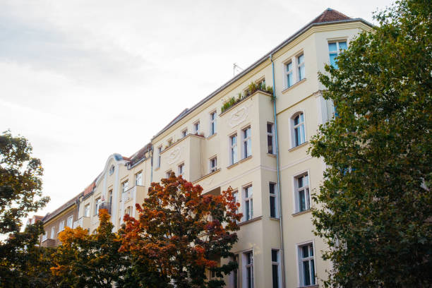 istock beautiful houses with autumn trees 867541132