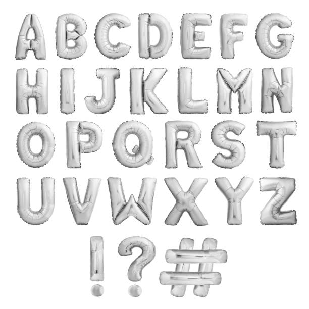 Full alphabet with exclamation point, question mark and hashtag of silver inflatable balloons isolated on white